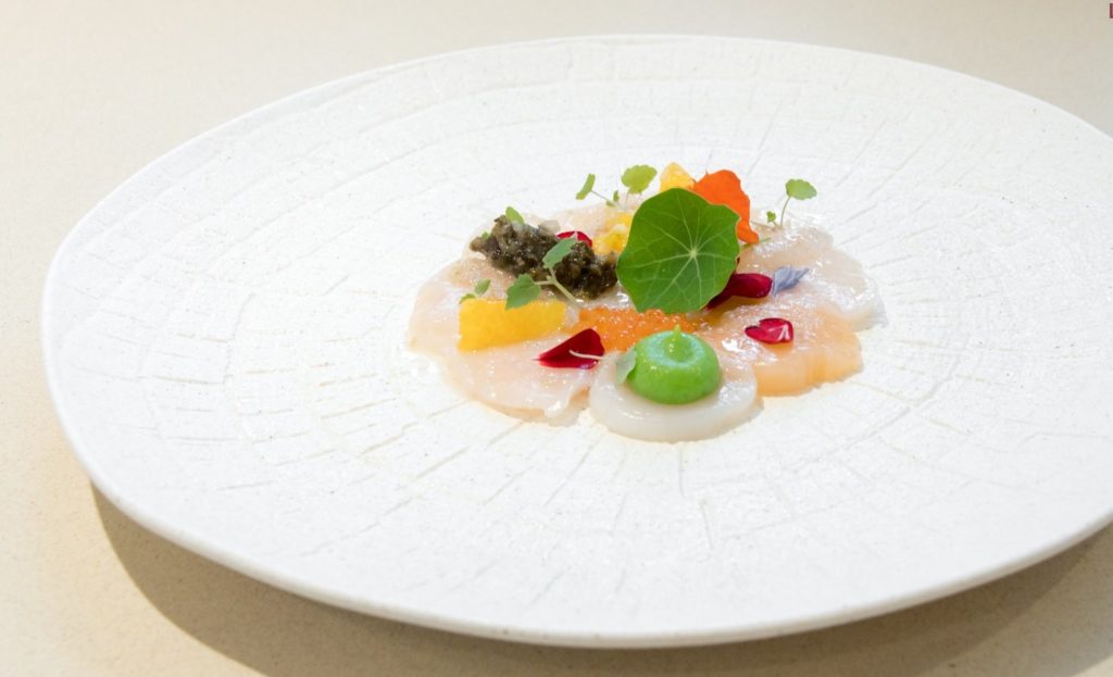 Delicate bass carpaccio, thinly sliced and topped with luxurious caviar. A refined dish that combines the natural sweetness of fresh bass with the briny elegance of caviar, offering a perfect balance of flavors